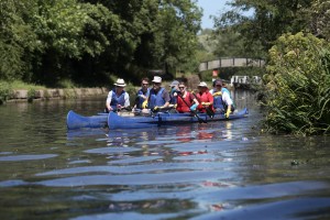 Volunteers in a bellboat clear rubbish from the river Soar at Leicester city. © Jiri Rezac 2015